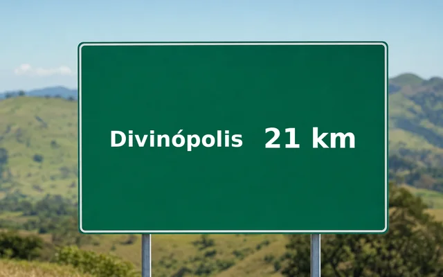 Placa de estrada indicando Divinópolis a 21 km
